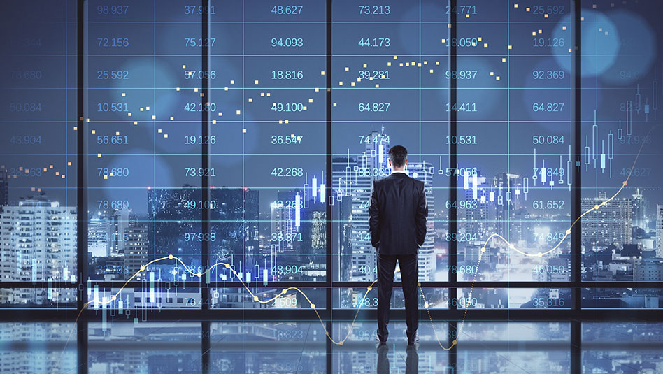 Man looking over buildings at night time in a city with superimposed images of numbers and charts .