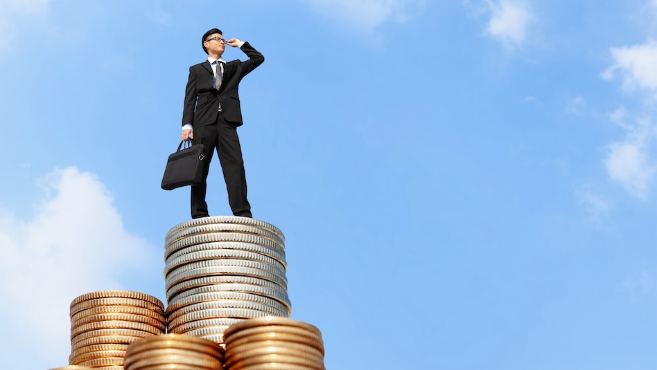 Man standing on coins